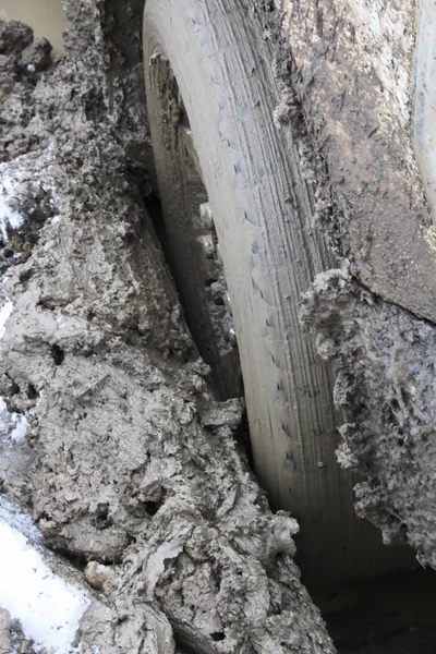 Closeup of a vehicle sinking in mud — ストック写真