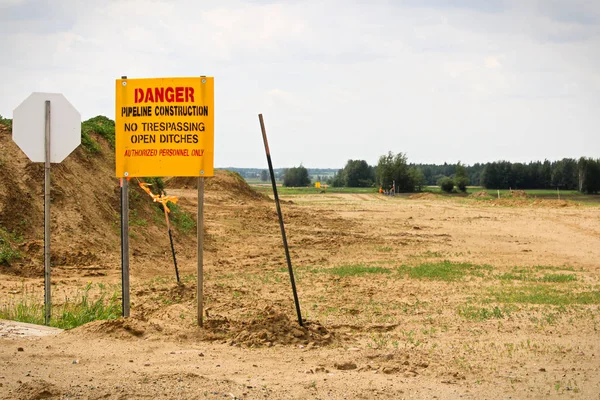 Danger Pipeline Construction sign with No Trespassing