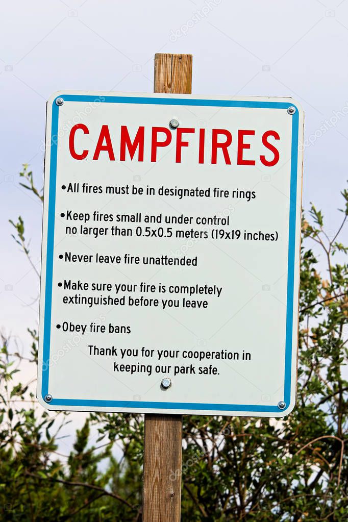 A campfire rules and reminder sign