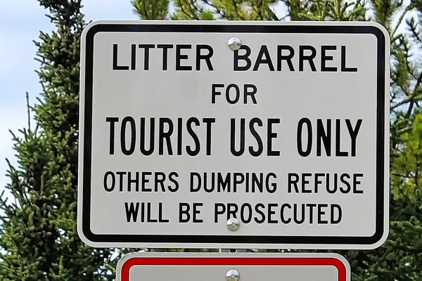 A litter barrel for tourist use only sign — 스톡 사진