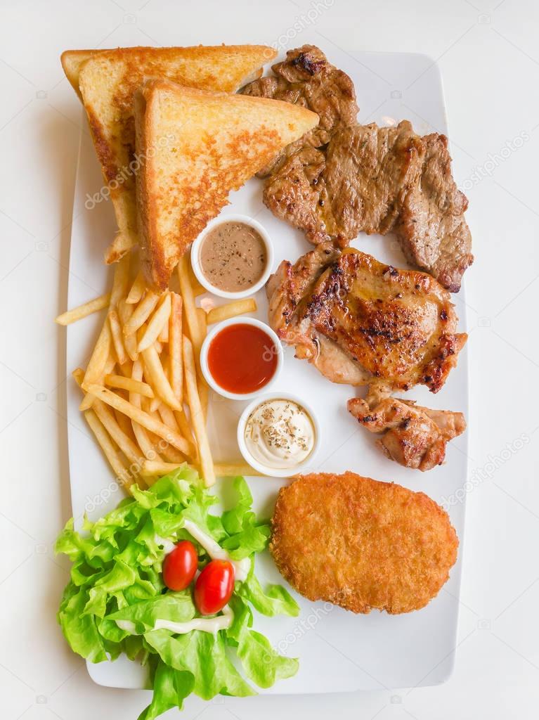 steak combo with beef chicken and fish