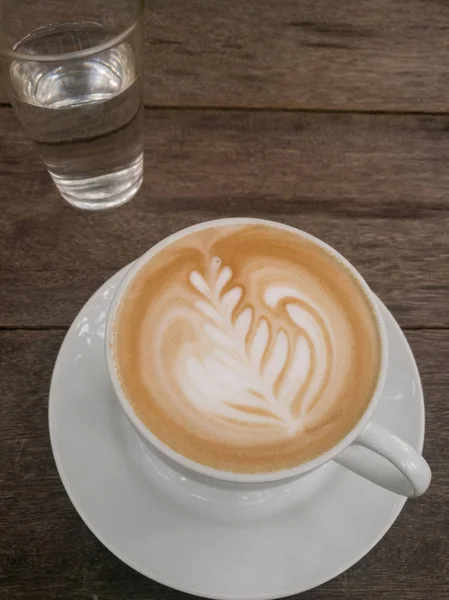 Cappuccino is in the white big cup. — Stock Photo, Image