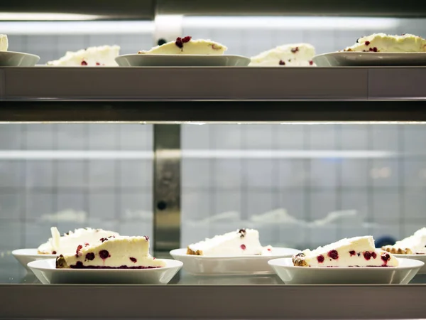 Cakes in the refrigerated display case