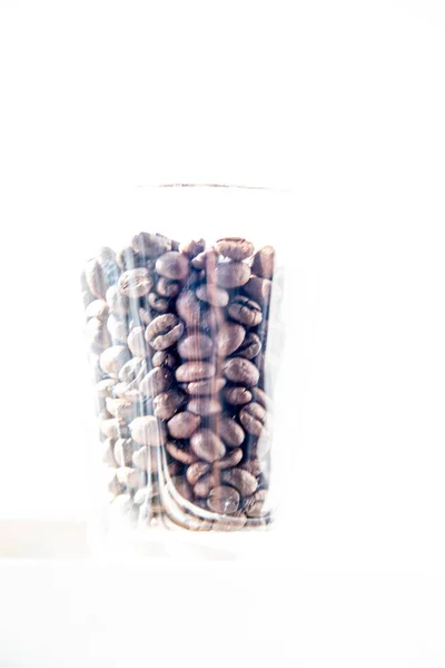 Roasted coffee beans in a glass for breakfast — Stock Photo, Image