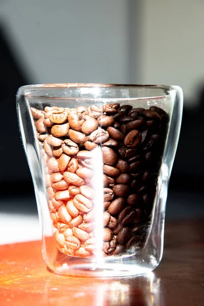 Roasted coffee beans in a glass for breakfast — Stock Photo, Image