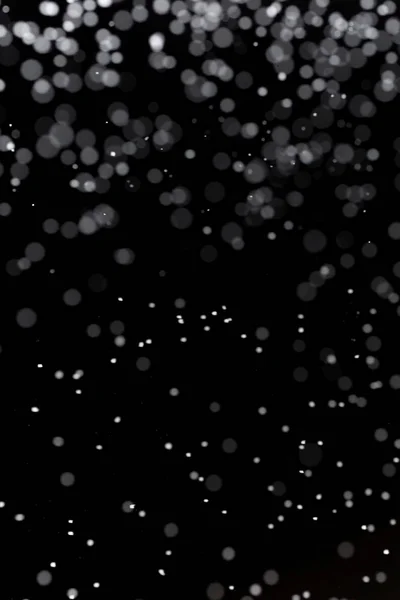 Valódi hó fekete háttér — Stock Fotó