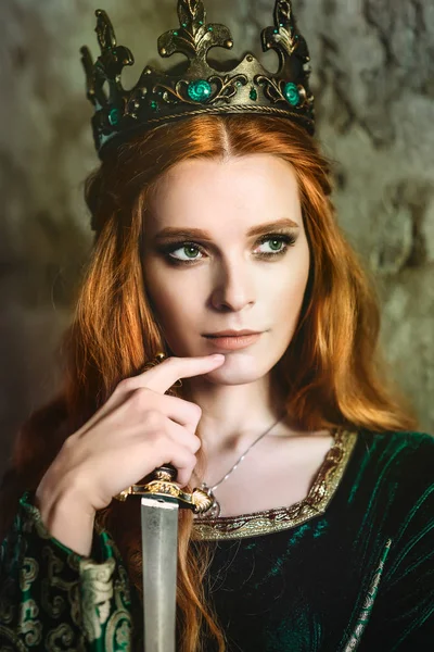 Woman in green medieval dress — Stock Photo, Image