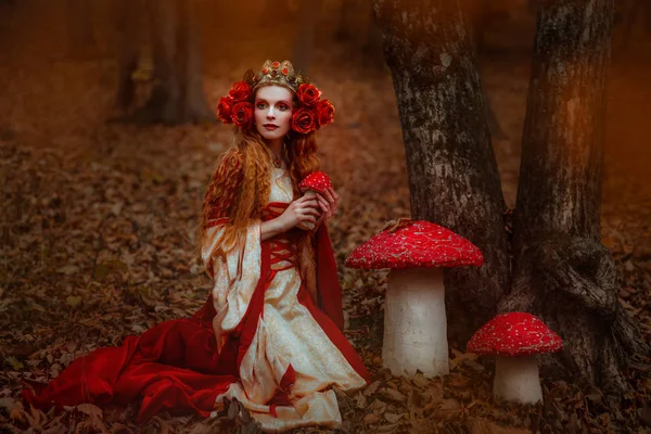 Žena v červené středověké šaty — Stock fotografie
