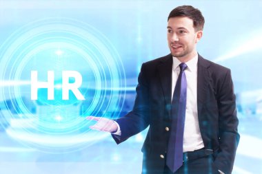 İş, Teknoloji, İnternet ve ağ konsepti. Genç işadamı geleceğin sanal ekranı üzerinde çalışıyor ve yazıyı görüyor.: 