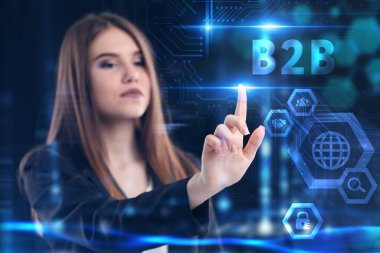 İş, Teknoloji, İnternet ve ağ konsepti. Genç işadamı geleceğin sanal ekranı üzerinde çalışıyor ve B2B yazısını görüyor.