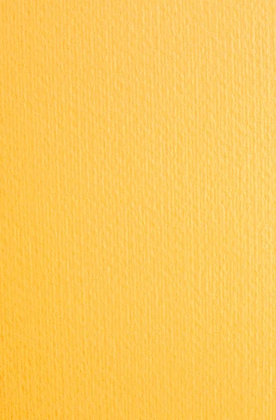 Sarı kağıt arkaplan niyetine. Nesnesiz turuncu desenli karton. Düz yüzey.