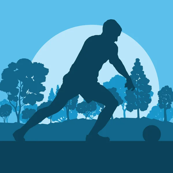 Joueur de football homme dans le paysage de fond vectoriel champ — Image vectorielle