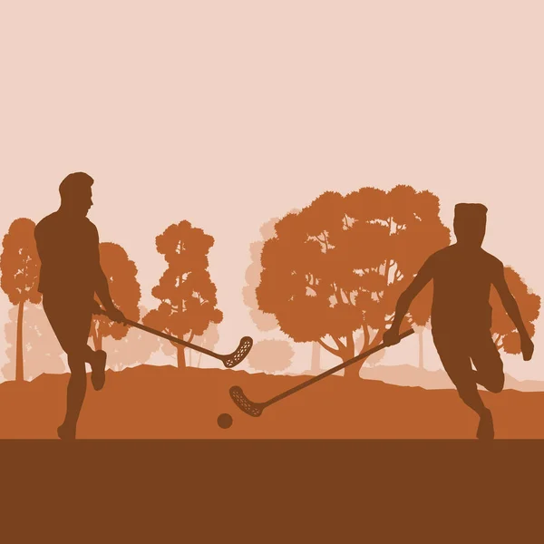 Floorball giocatore in parco con bastone da hockey e palla al tramonto un — Vettoriale Stock