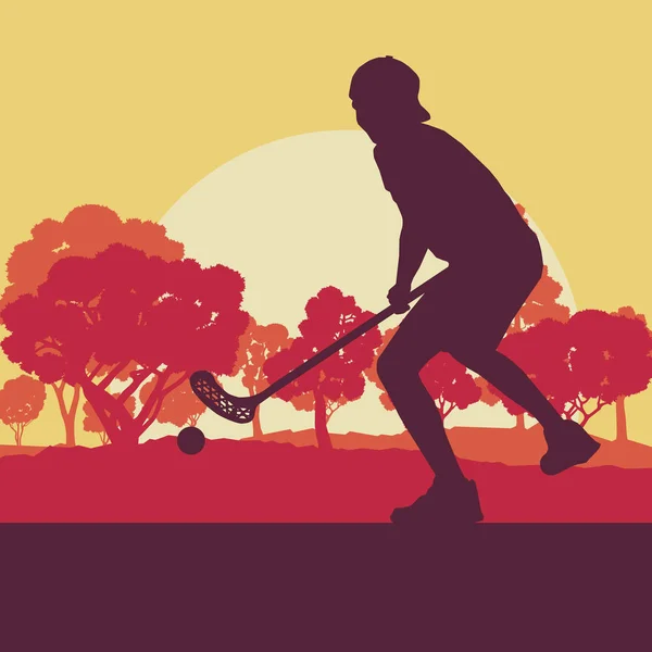 Jugador de pelota en el parque con palo de hockey y pelota en la puesta del sol un — Vector de stock