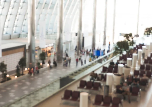 Fundo azul: Saída do Terminal Check-in no aeroporto com bokeh — Fotografia de Stock