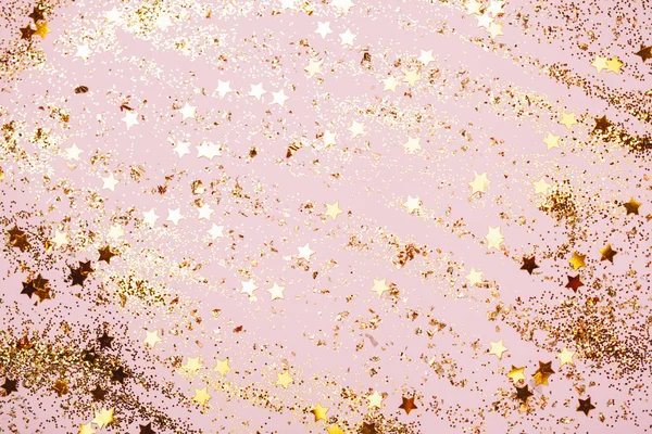 Pink confetti and stars and sparkles on pink background. — Stock Photo, Image