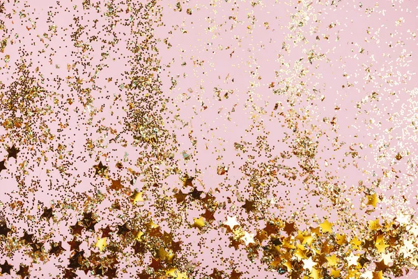 Pink confetti and stars and sparkles on pink background. — Stock Photo, Image