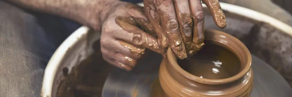 A day in the life of a pottery artist - at the pottery wheel.