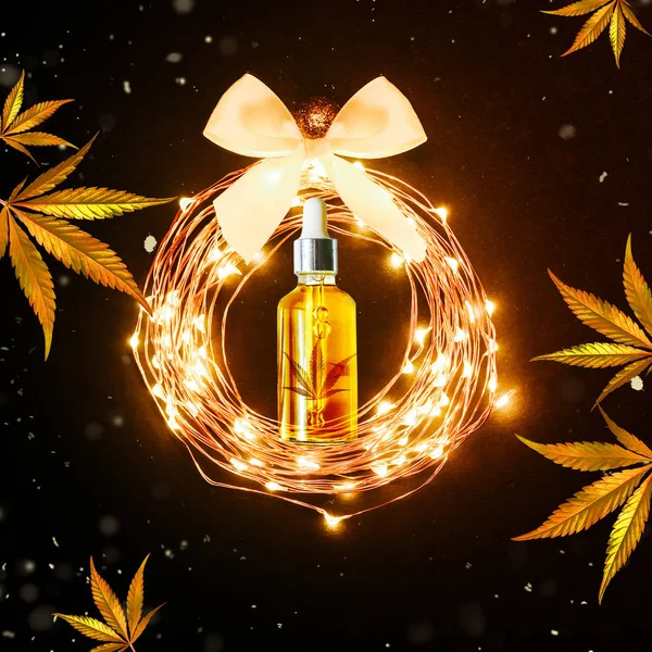 Uroczysta, świąteczna koncepcja Cbd Oil. Cbd cannabisas olej w świątecznym wystroju jako prezent Holiday Design Concept — Zdjęcie stockowe