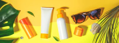 Sunscreen. Prevention of photoaging. Flat lay, natural cosmetics SPF for face, body. Concept summer vacation. Banner