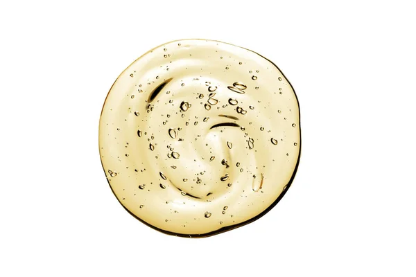 Vitamin C serum, cosmetic gel texture. Transparent yellow gel with bubbles in a beautiful smear — Stock Photo, Image