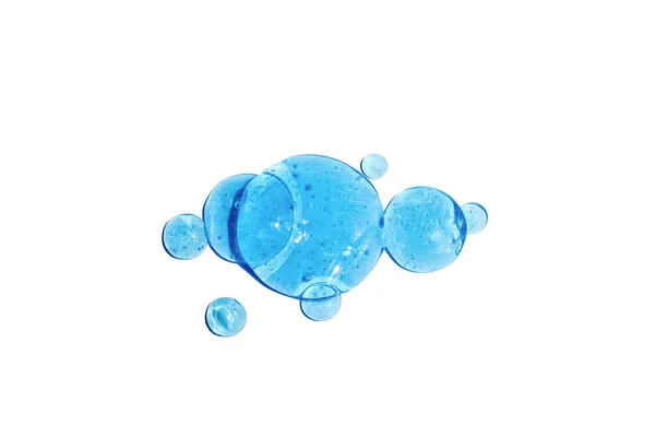 Water texture with bubbles Hyaluronic acid cosmetic gel. Gel texture with bubbles on a blue background. — Stock Photo, Image