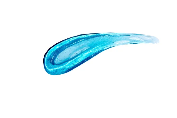 Watertextuur met belletjes Hyaluronzuur cosmetische gel. Gel textuur met belletjes op een blauwe achtergrond. — Stockfoto