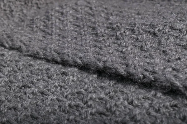 Close up van gebreide grijze wol stof — Stockfoto