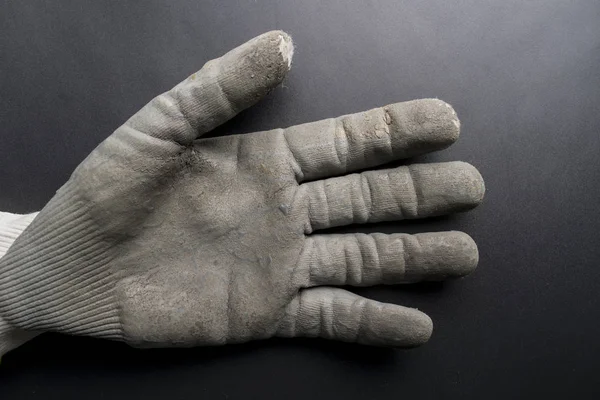 Guantes de trabajo aislados sobre un fondo oscuro . —  Fotos de Stock