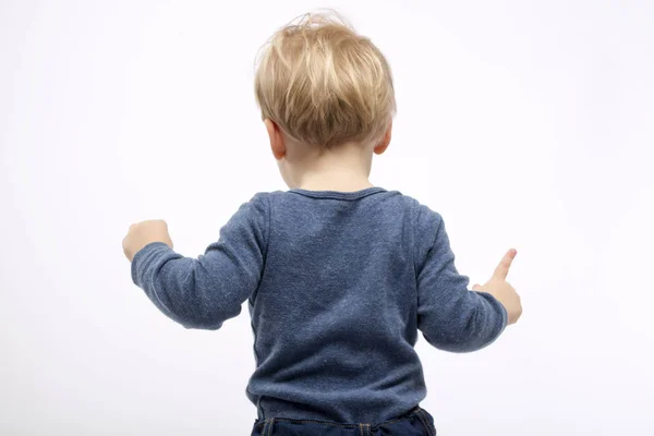 Two years toddler on white background. back view — Stock Photo, Image