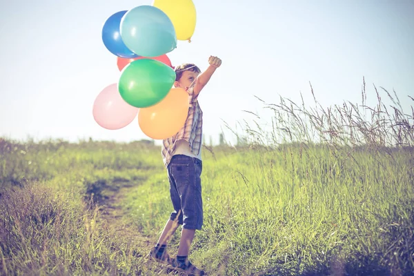 Happy Little Boy Playing Road Day Time Running Field Holding — Stock Photo, Image