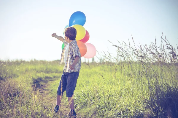 Happy Little Boy Playing Road Day Time Running Field Holding — Stock Photo, Image