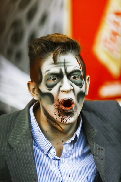 Street performer in Halloween costume and makeup. — Stock Photo, Image