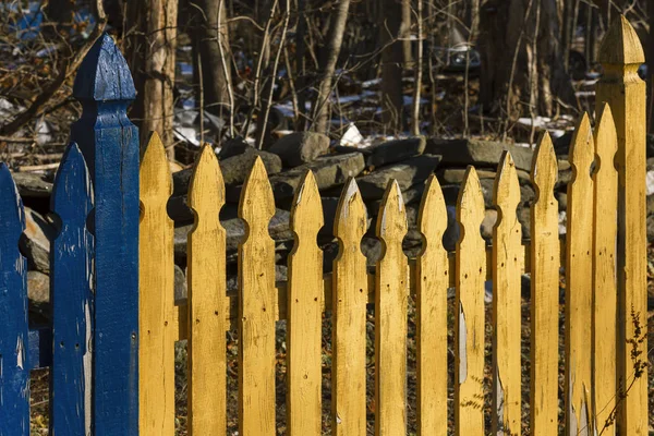 Picket fence on a farmland. — Stock Photo, Image