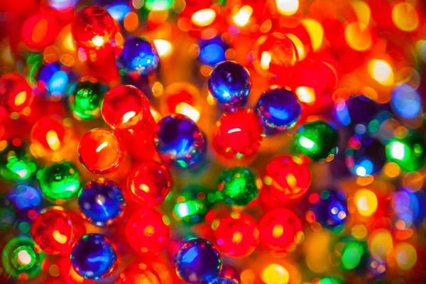 Christmas tree lights bulbs closeup on bokeh colorful — Stock Photo, Image