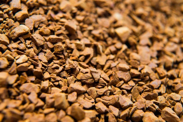 Pilha de grãos de café instantâneas fundo close-up — Fotografia de Stock