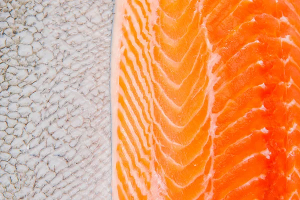 Свіже філе лосося і фон текстури шкіри лосося — стокове фото