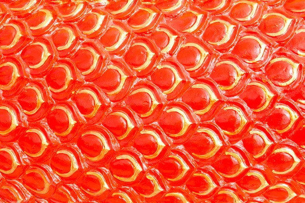 Fondo de escamas de dragón rojo o estuco de serpiente — Foto de Stock