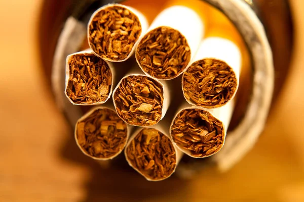 Tas de cigarettes de tabac, pile comme texture de fond fermer — Photo