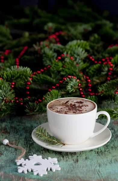 A cup of coffee on a wooden background — Stock Photo, Image