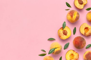 Summer fruit background. Flat lay composition with peaches. Ripe juicy peaches with green leaves on pink background. Flat lay top view copy space. Fresh organic fruit vegan food. Harvest concept. clipart