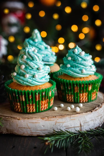 Citrus cupcakes with butter cream and festive decor for New Year and Christmas. — Stock Photo, Image