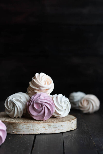 Assorted different flavors of homemade marshmallows. Peach, pink and white marshmallows.