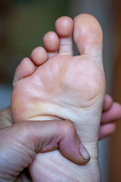 young girl\'s toes are healthy and beautiful. Well-groomed Concept for medical articles and ointments - the image of the feet. Image of legs with space for inscriptions and advertising.