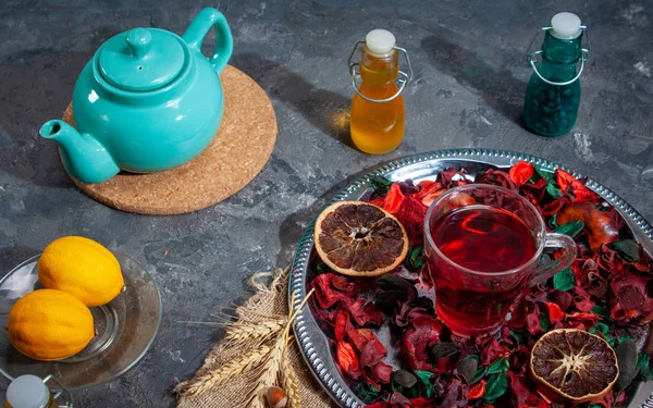 Red Hot Hibiscus tea in a glass mug