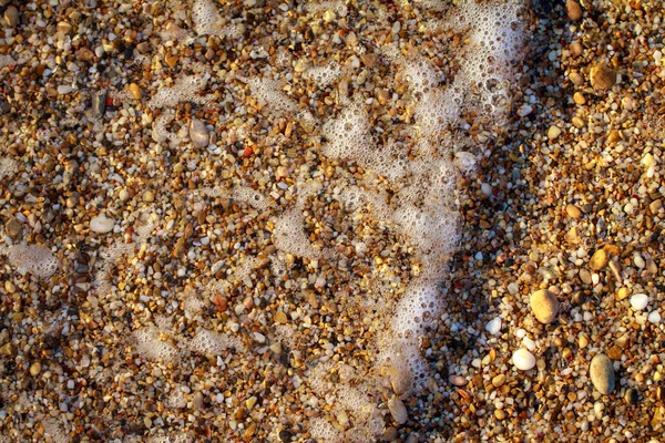Tengeri kavicsok színes gránit a tengerparton — Stock Fotó