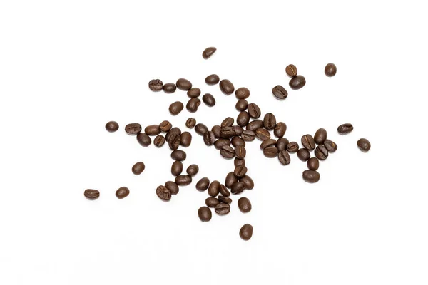 Kaffeebohnen isoliert auf weißem Hintergrund. Bild aus nächster Nähe. lizenzfreie Stockbilder