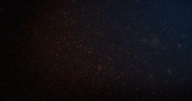 Turuncu parçacıklar arka plan hareketli döngü