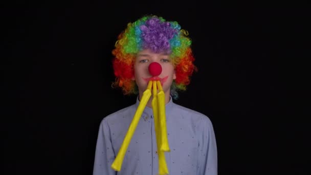 Portrait of a clown on a black background — Stock Video