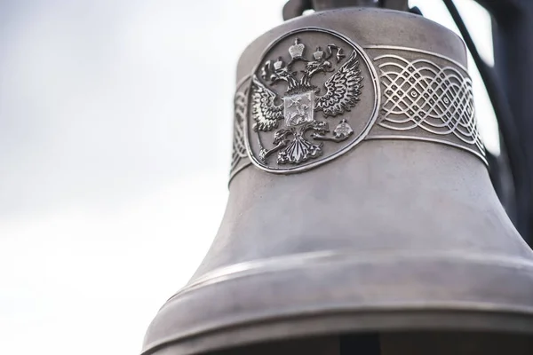 ship\'s bell with the Russian coat of arms